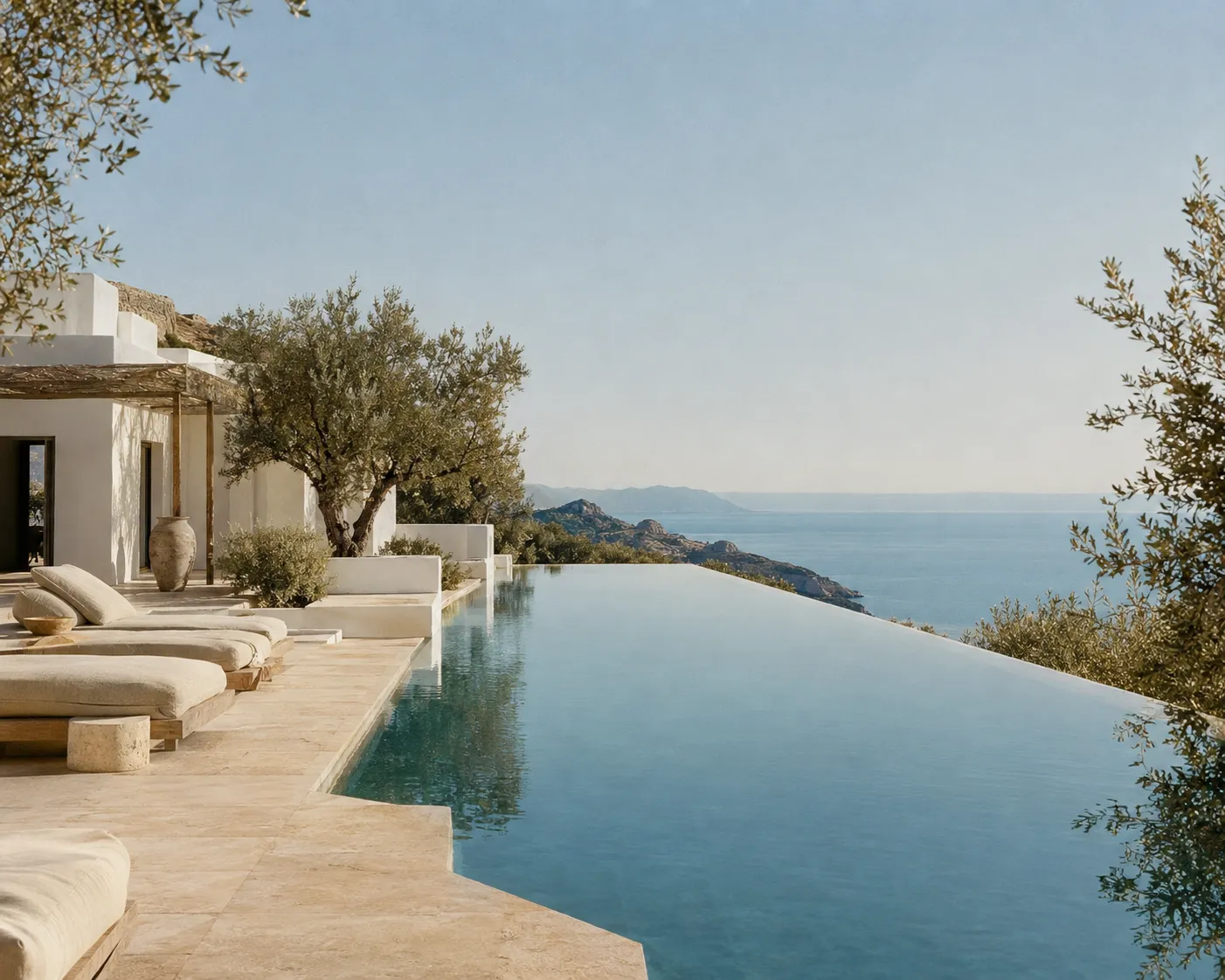 A whitewashed Mediterranean retreat with an infinity pool above the sea
